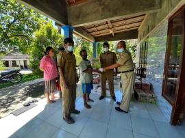 PEMBERIAN PAKET SEMBAKO UNTUK ISOLASI MANDIRI